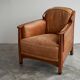 Art Deco armchair in solid oak and leather by Frits Schuitema