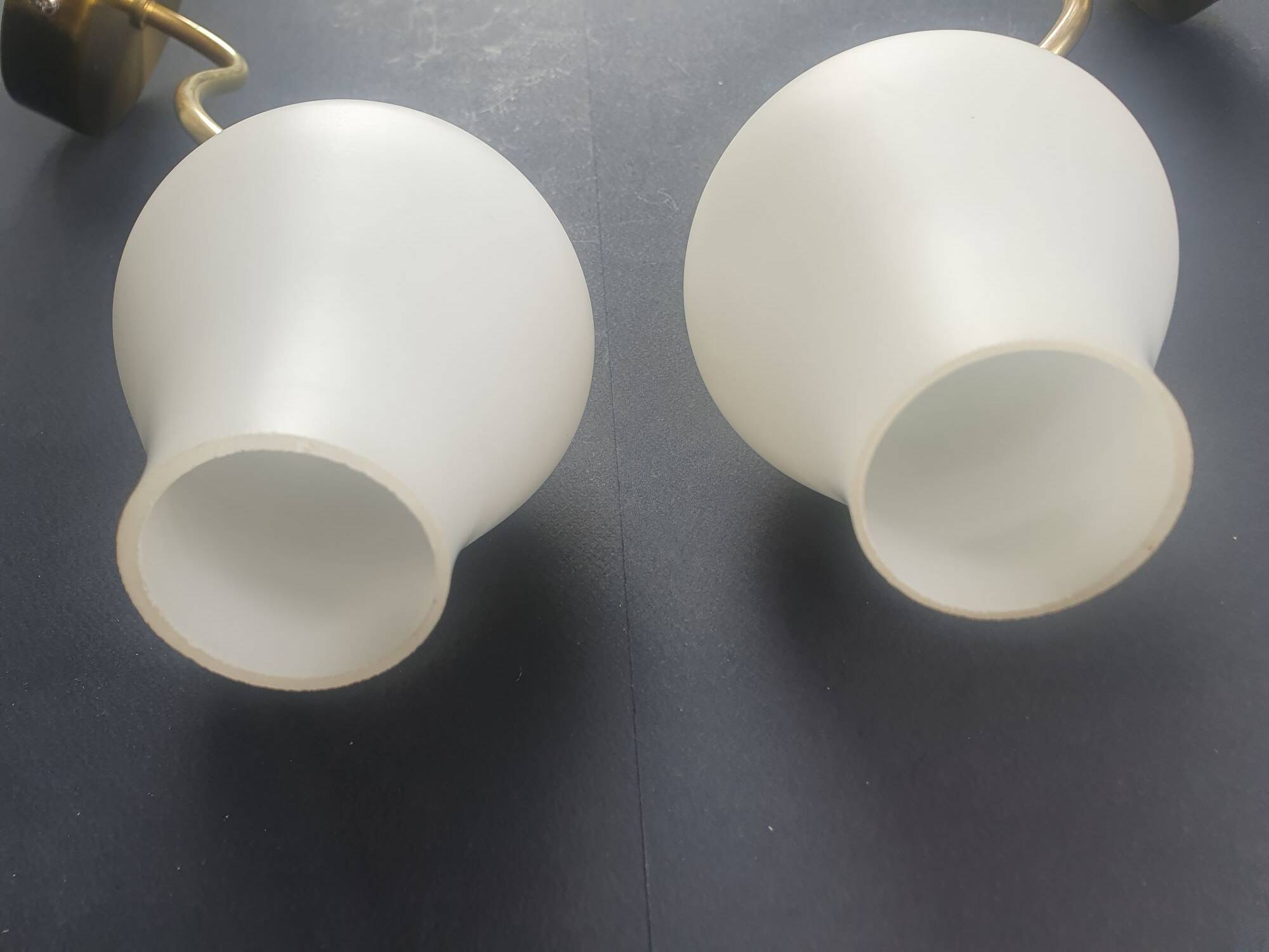 Pair of vintage wall sconces in gilded brass and opaline glass from the 1950s.