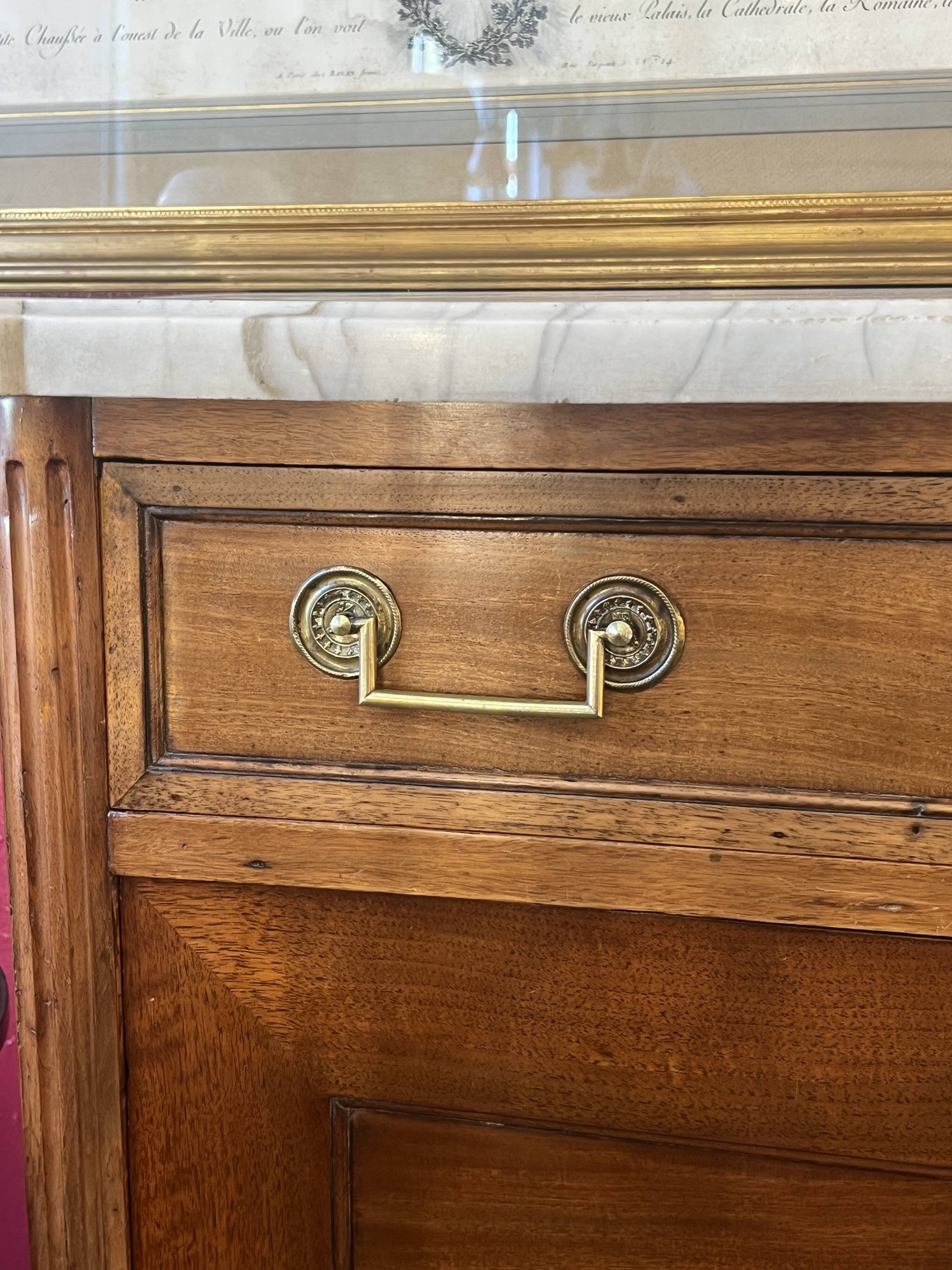 Louis XVI period mahogany secretary, white marble top, clover lock