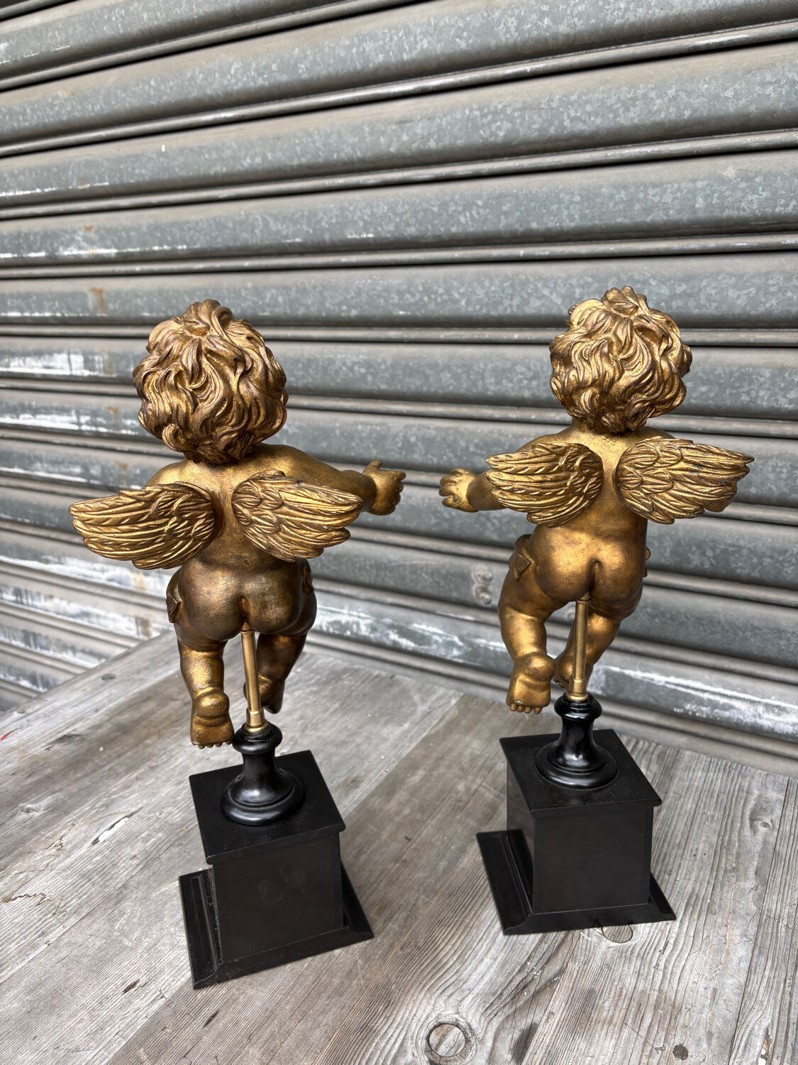 Pair of gilded cherubs on a Napoléon III base