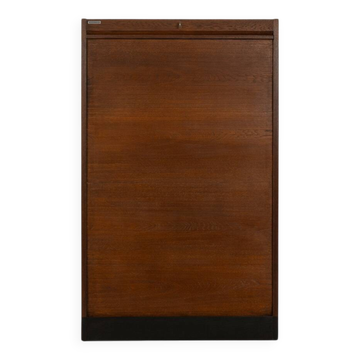 Cabinet tambour des années 1950, en placage de chêne teinté foncé.