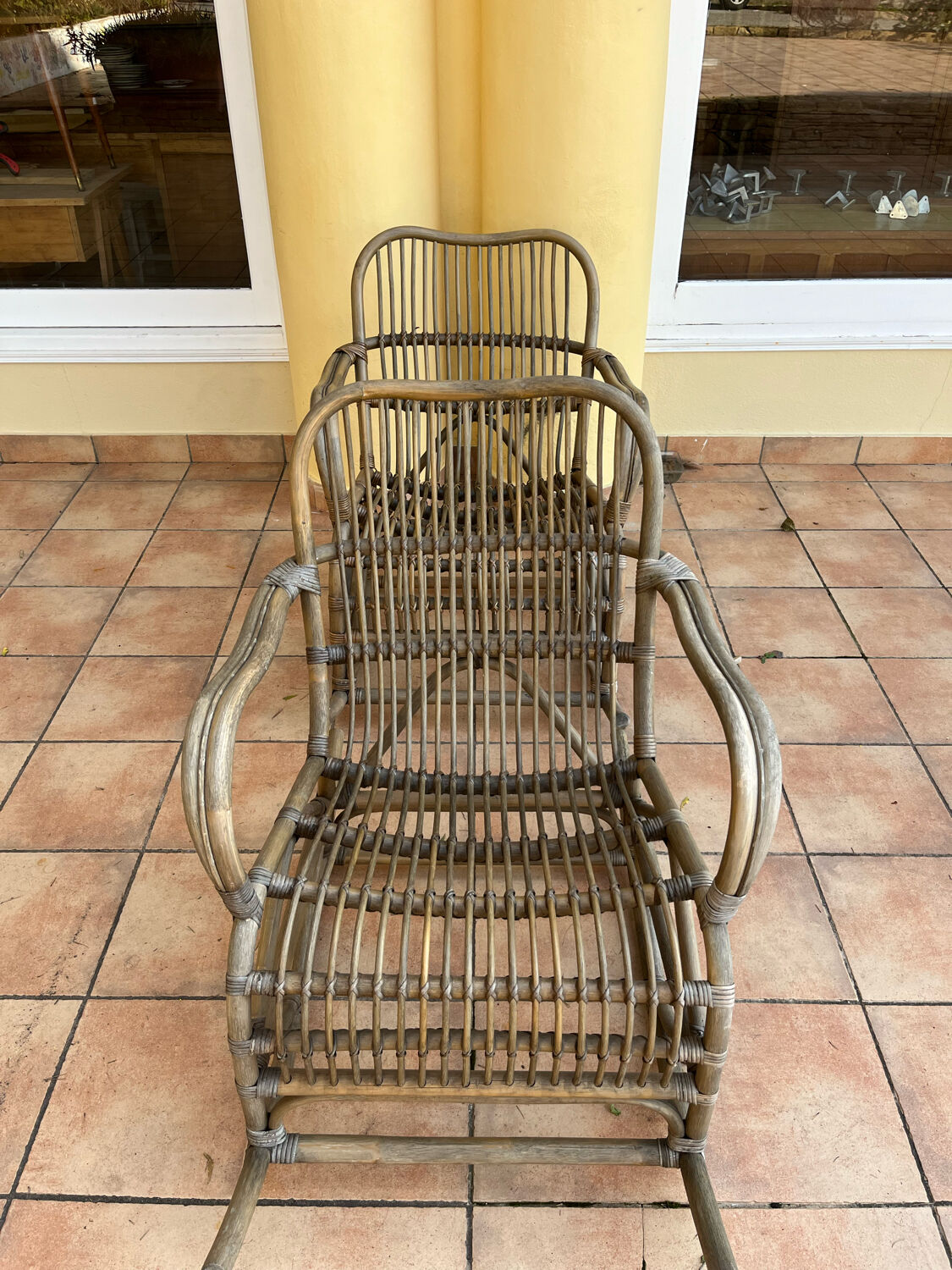 Pair of rocking-chairs in rattan 70s