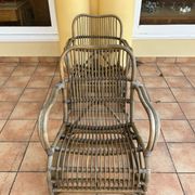 Pair of rocking-chairs in rattan 70s