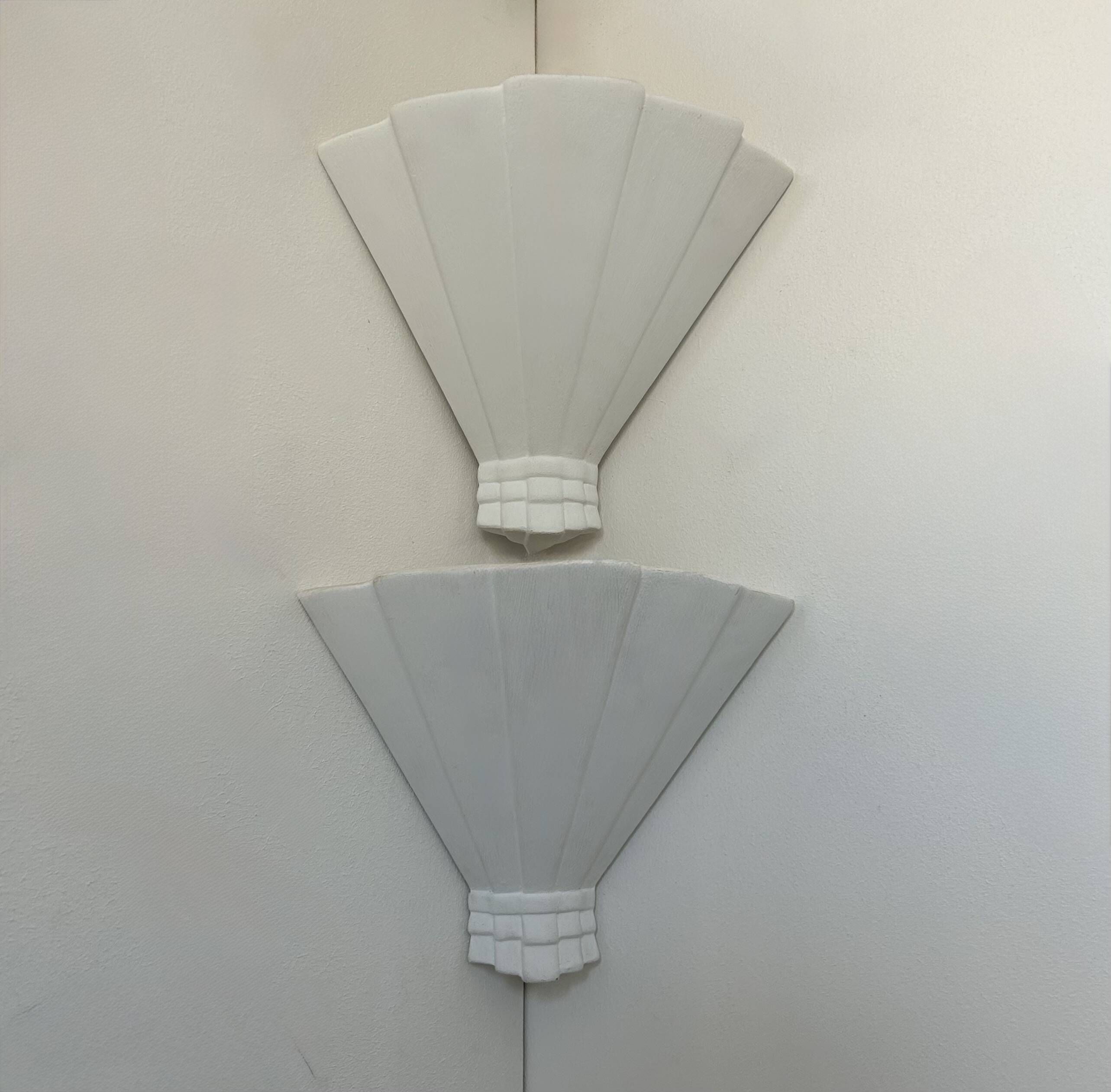 Pair of vintage corner wall lights, matte white plaster, France, 1970.