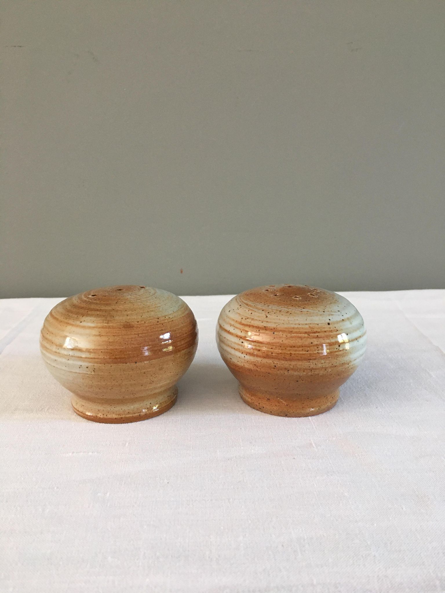 Vintage salt and pepper shaker in sandstone