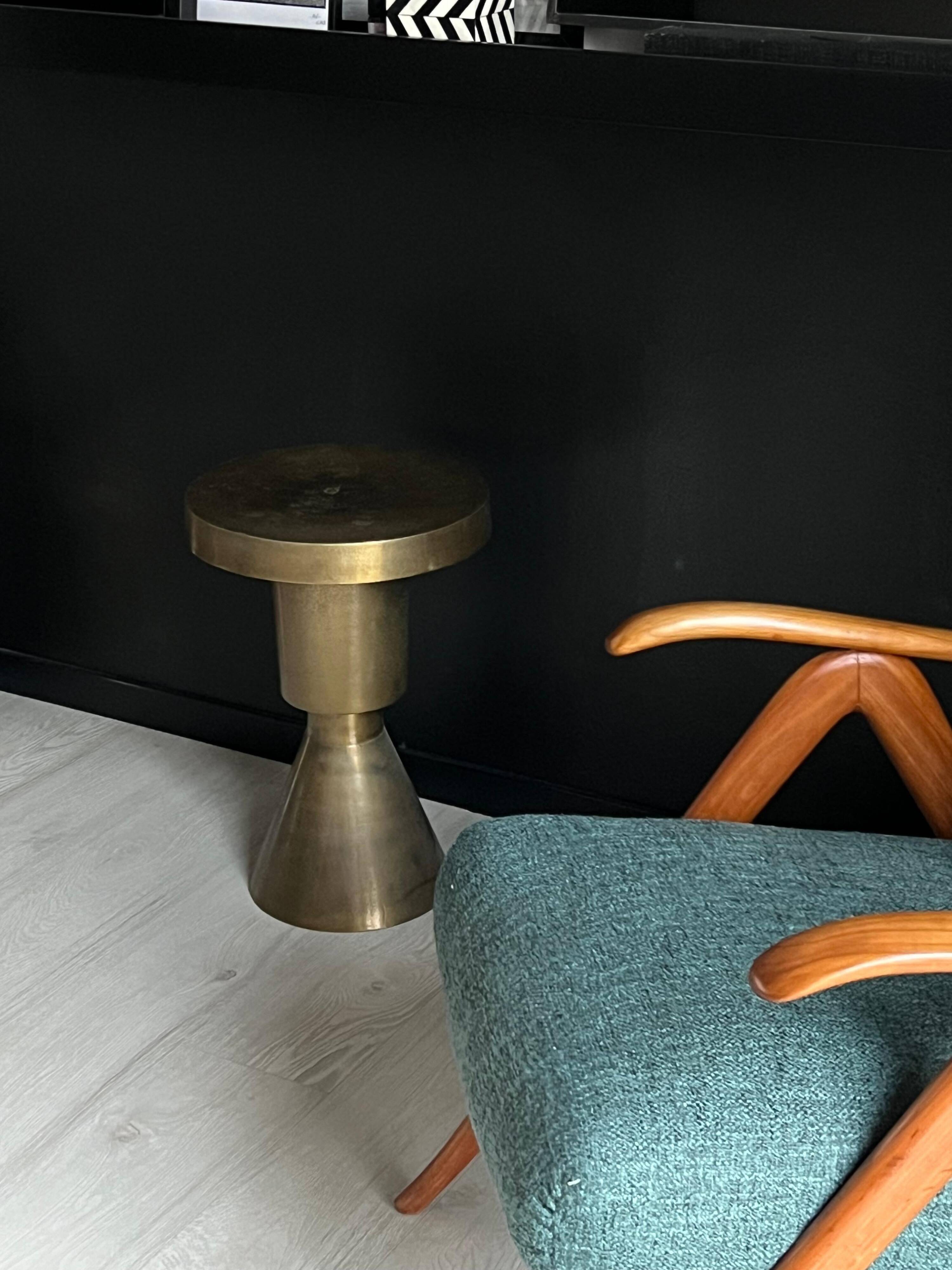 Sculptural metal side table, contemporary brassy side for modern interiors