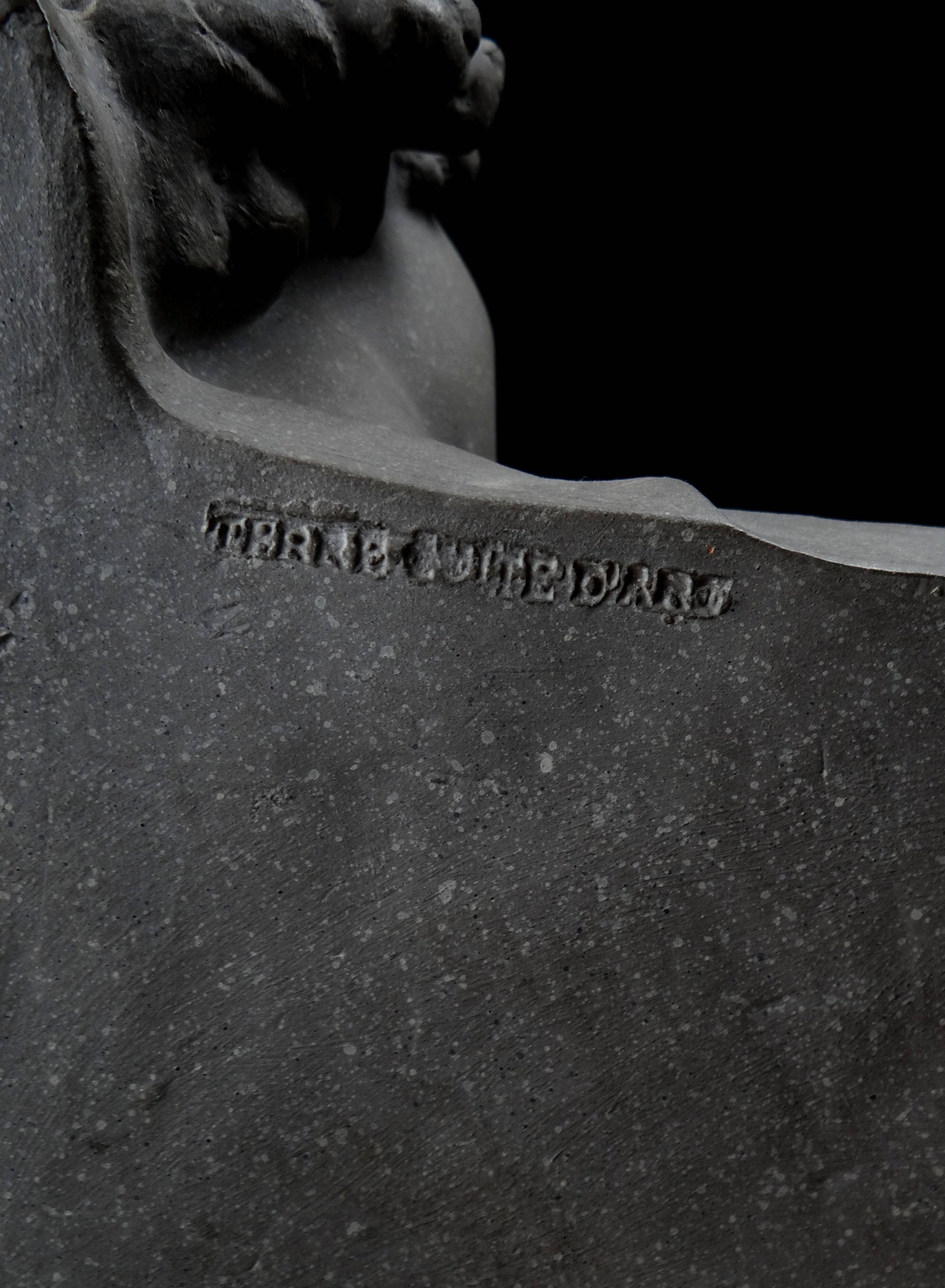 Terracotta bust of the smiling angel from Reims Cathedral with base
