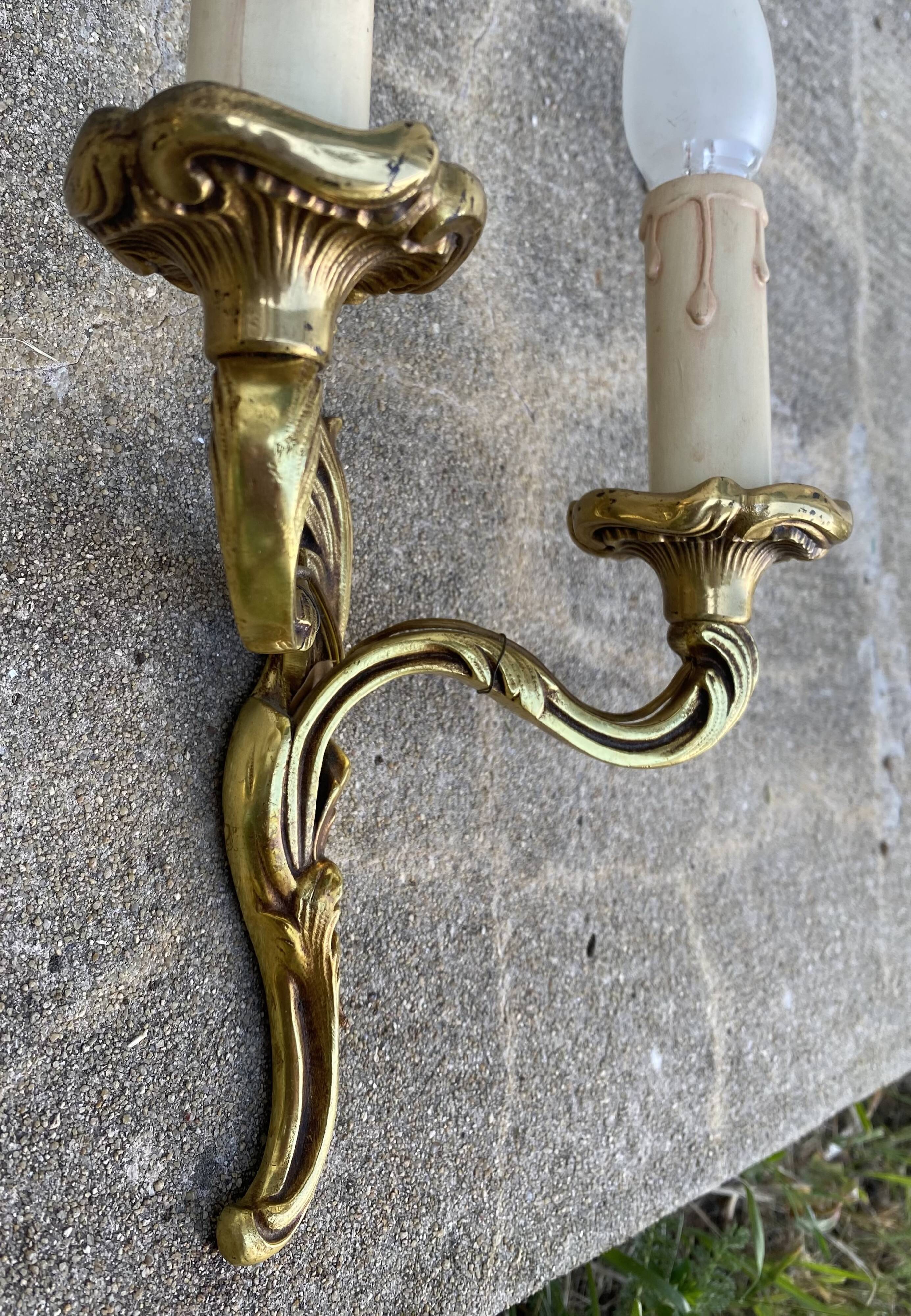 Pair of baroque gilt bronze wall lamps
