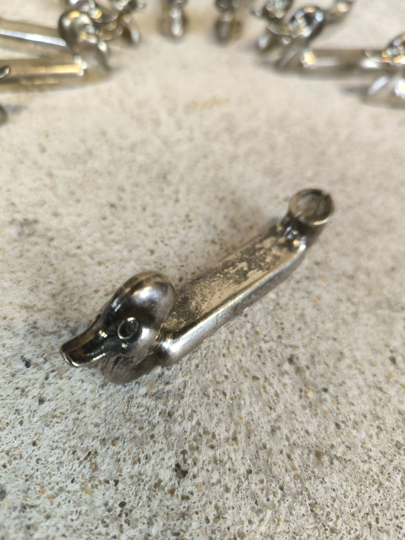Set of 12 vintage knife rests, place card holders.