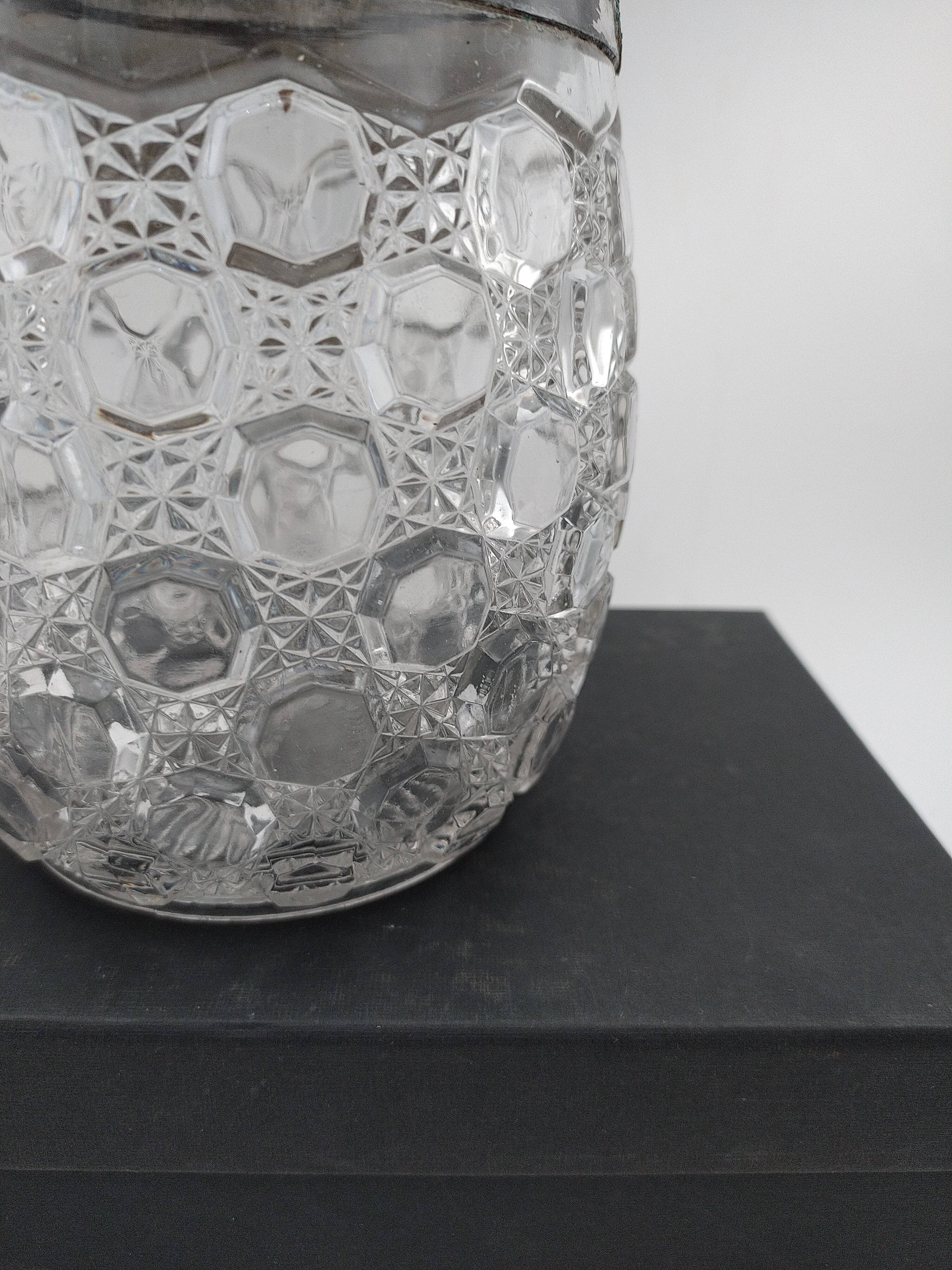 Biscuit, ice cube or candy pot, made of crystal and metal.
