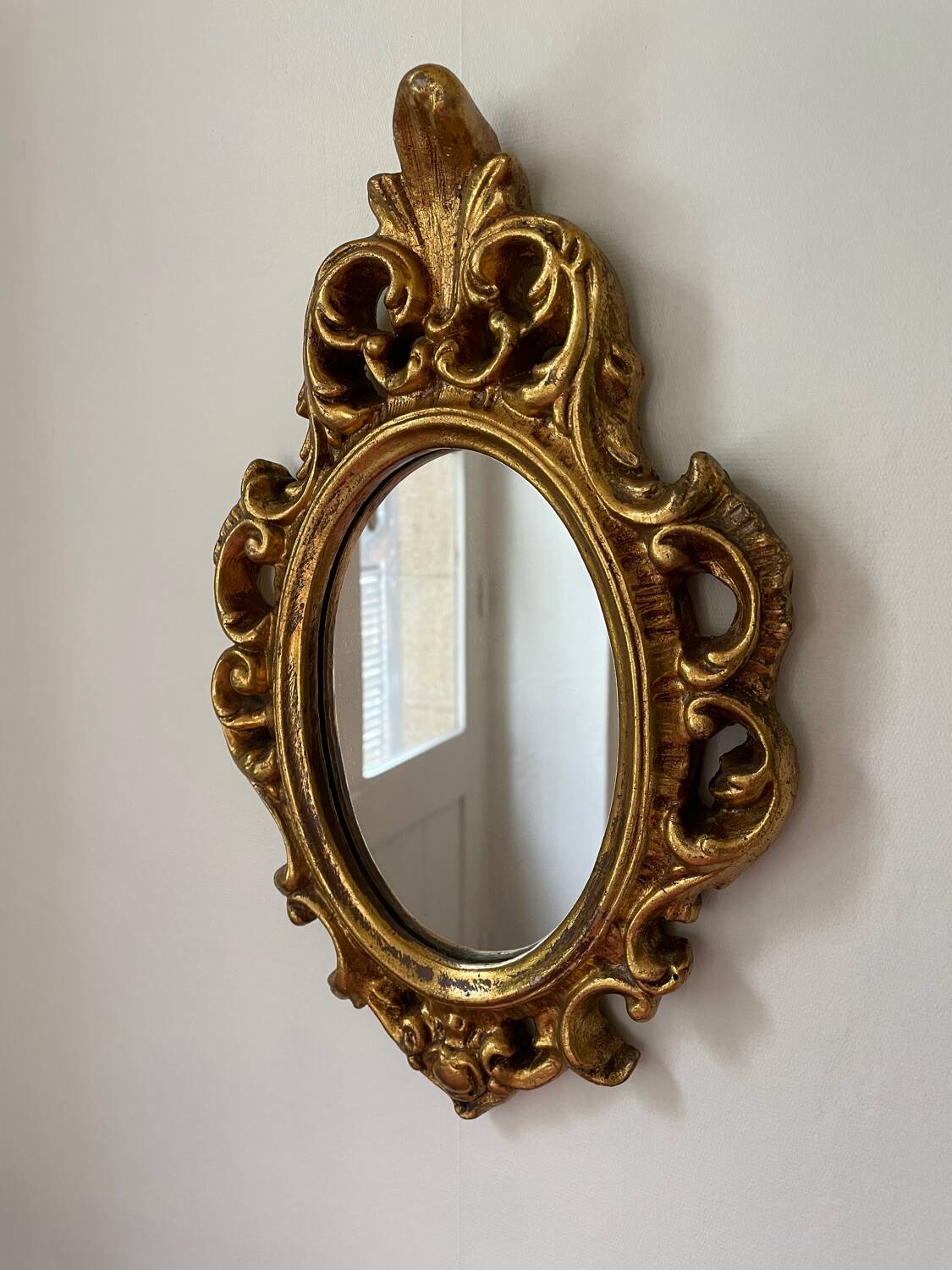 Golden rockery mirror