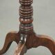 Antique English oak tilt top table from the 19th century in a unique shape