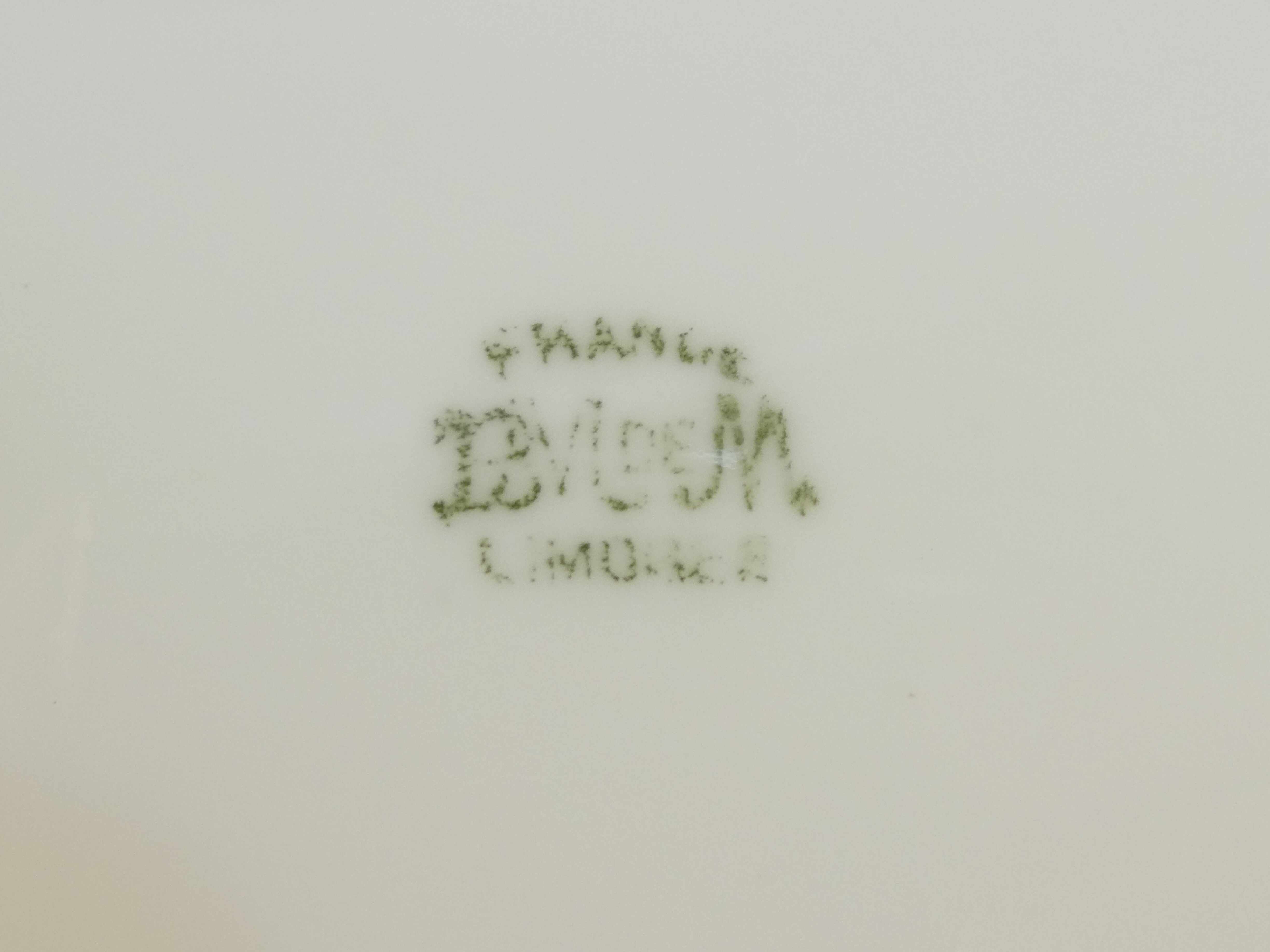 Pair of limoges porcelain plate ''Mandavy de mavaleix'' rose decoration