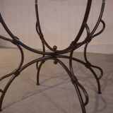 Folding wrought iron table base and indoor/outdoor glass top