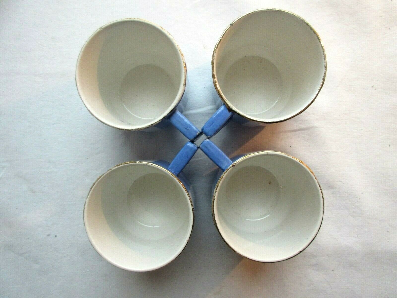 Set of 4 coffee cups with 4 saucers signed Sarreguemines model FOX TROTT
