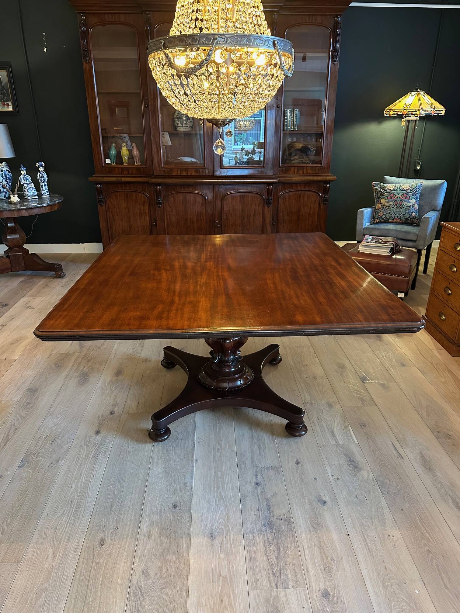 19th century almost square antique mahogany dining table.