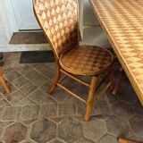 Table and chairs in woven chestnut