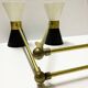 Italian articulated double wall light from the 50s