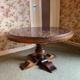 Round table in rustic and vintage wood and marble