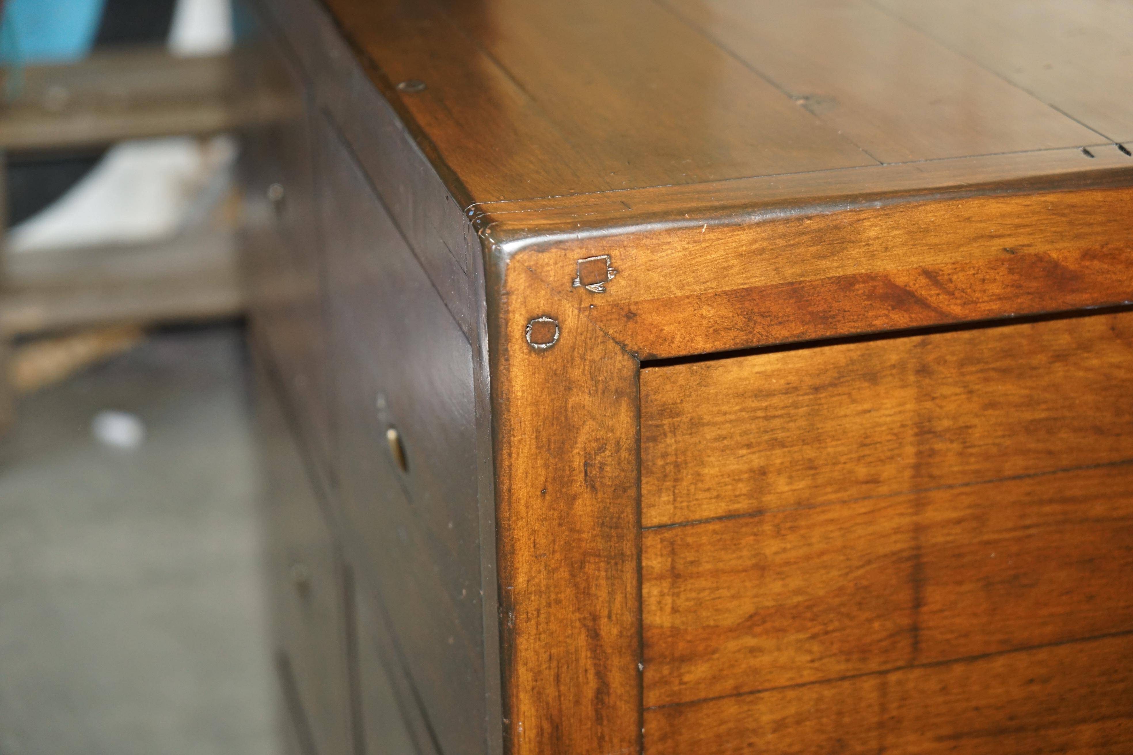Large vintage hardwood furniture in military country style.