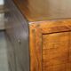 Large vintage hardwood furniture in military country style.