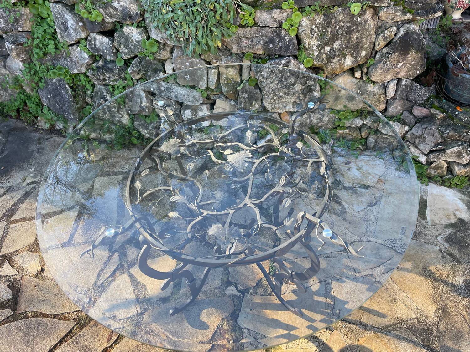 Round wrought iron table for 6 people