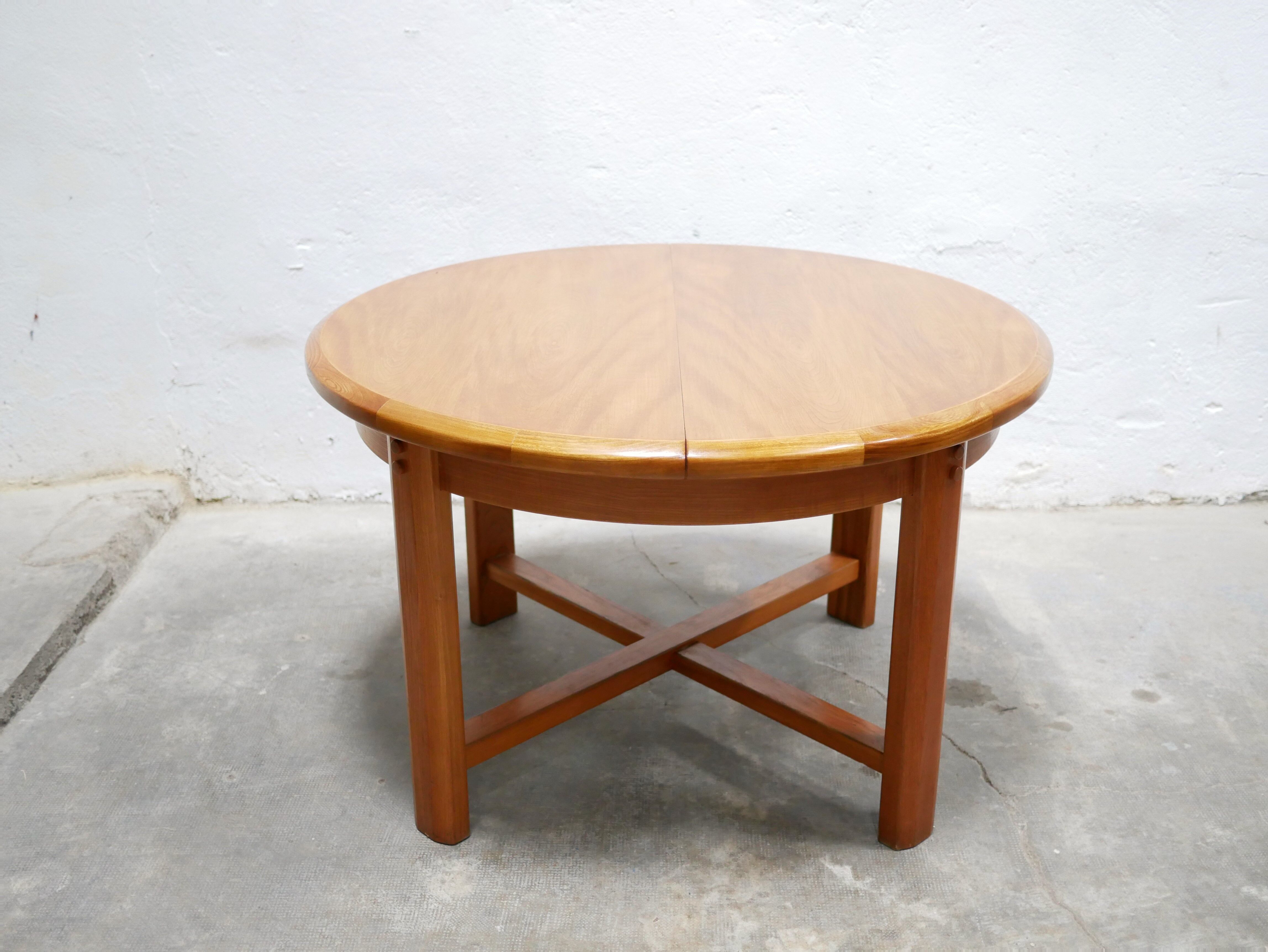 Vintage extendable round wooden dining table