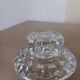Moulded glass candle holders.
