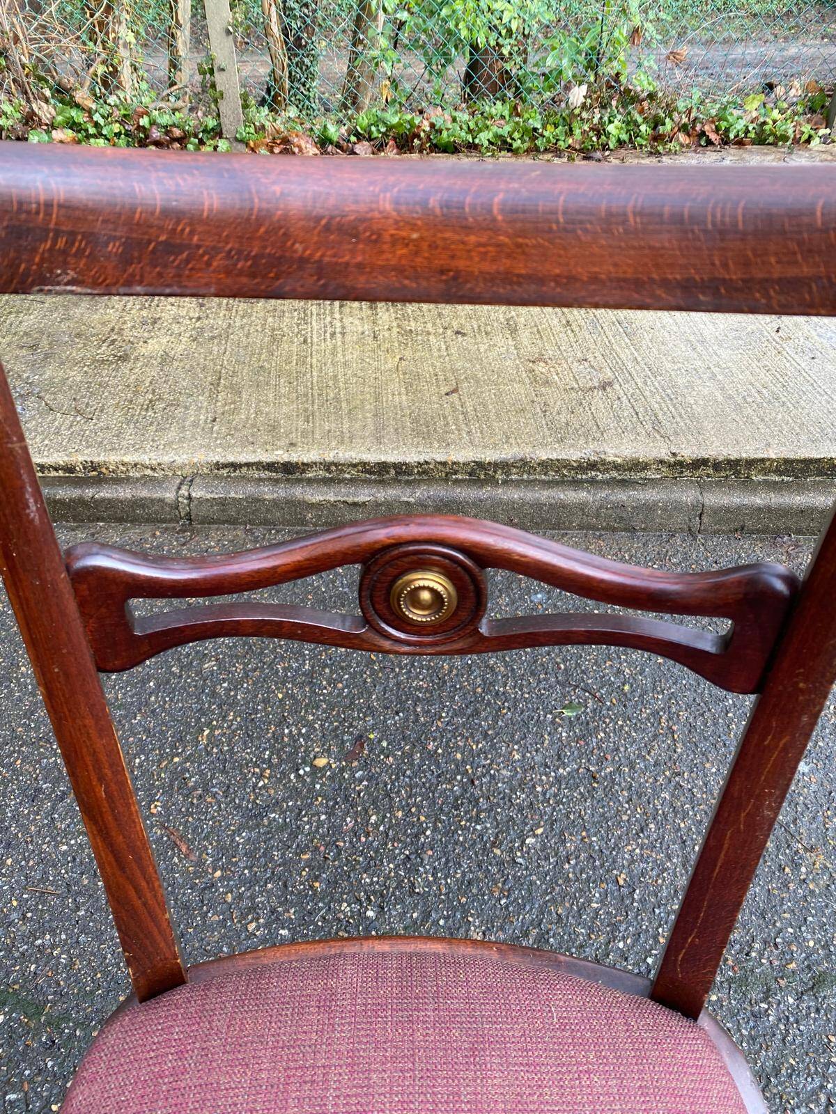 Mahogany chair in English style with burgundy fabric from the 20th century.