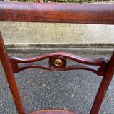Mahogany chair in English style with burgundy fabric from the 20th century.