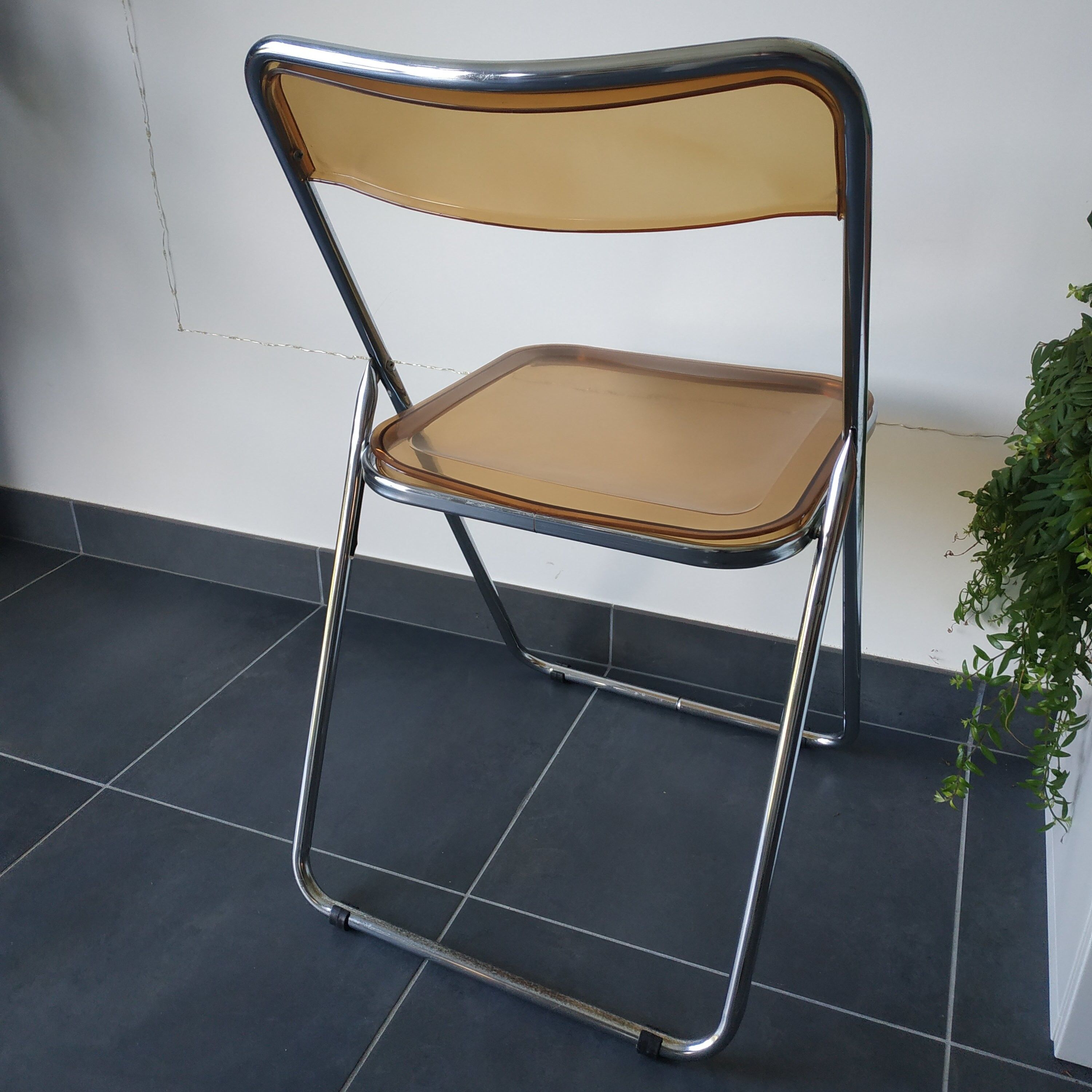 Seventies stainless steel and caramel chairs