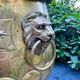 Large brass lion planter with a hallmark from the 19th century.