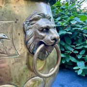 Large brass lion planter with a hallmark from the 19th century.