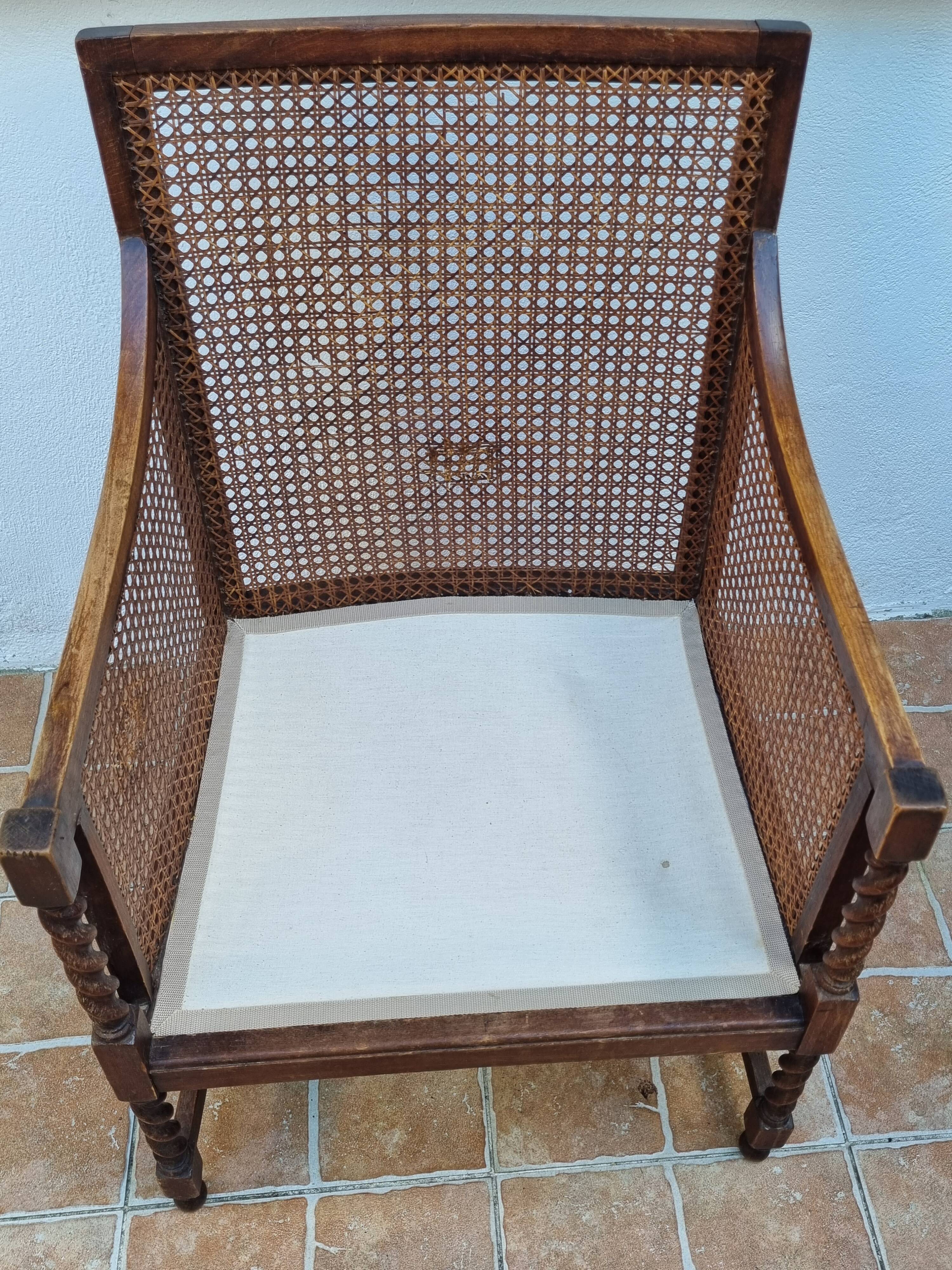 Vintage armchair in turned wood and cane, upholstered seat, 1940s