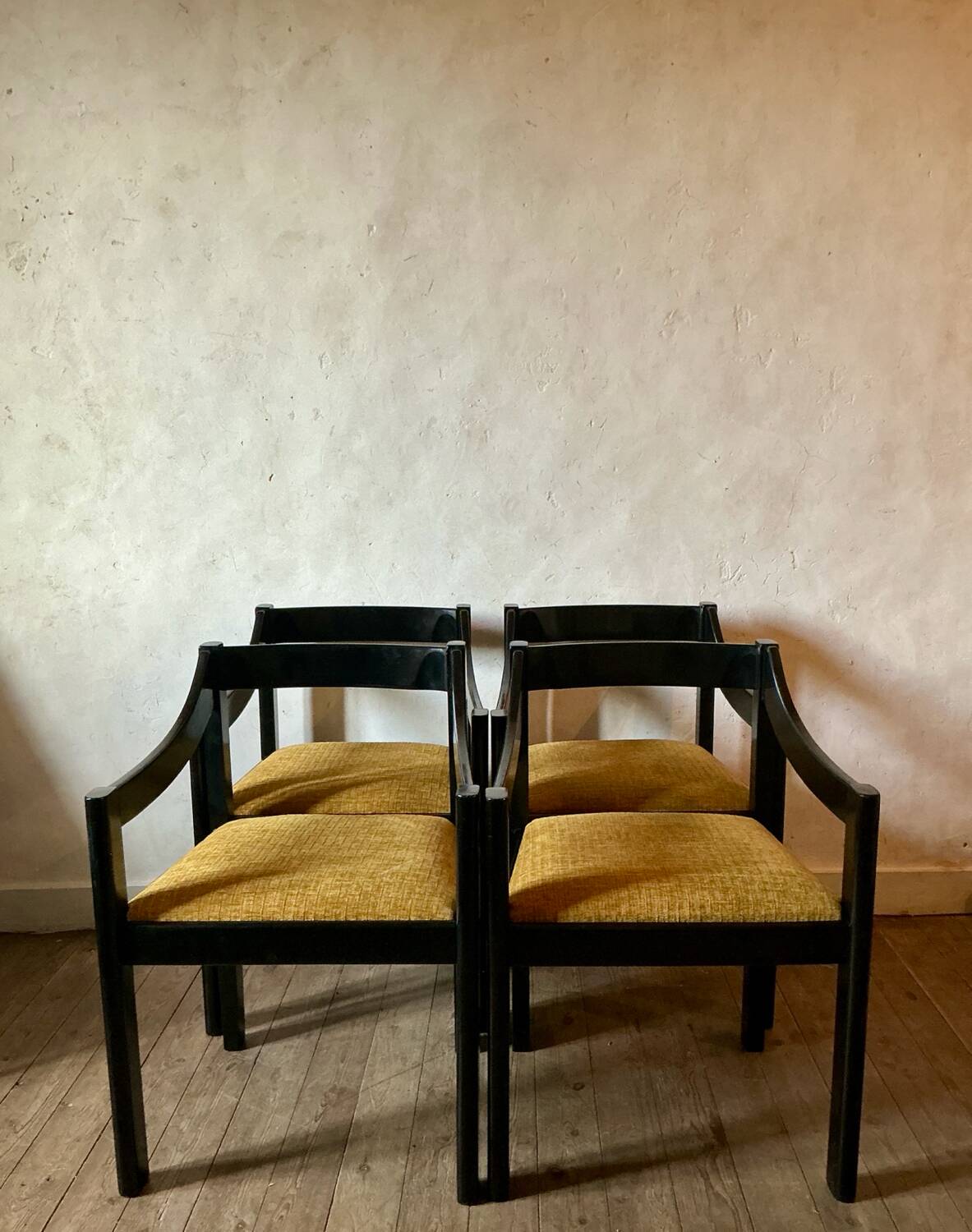 Four designer armchairs