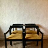 Four designer armchairs