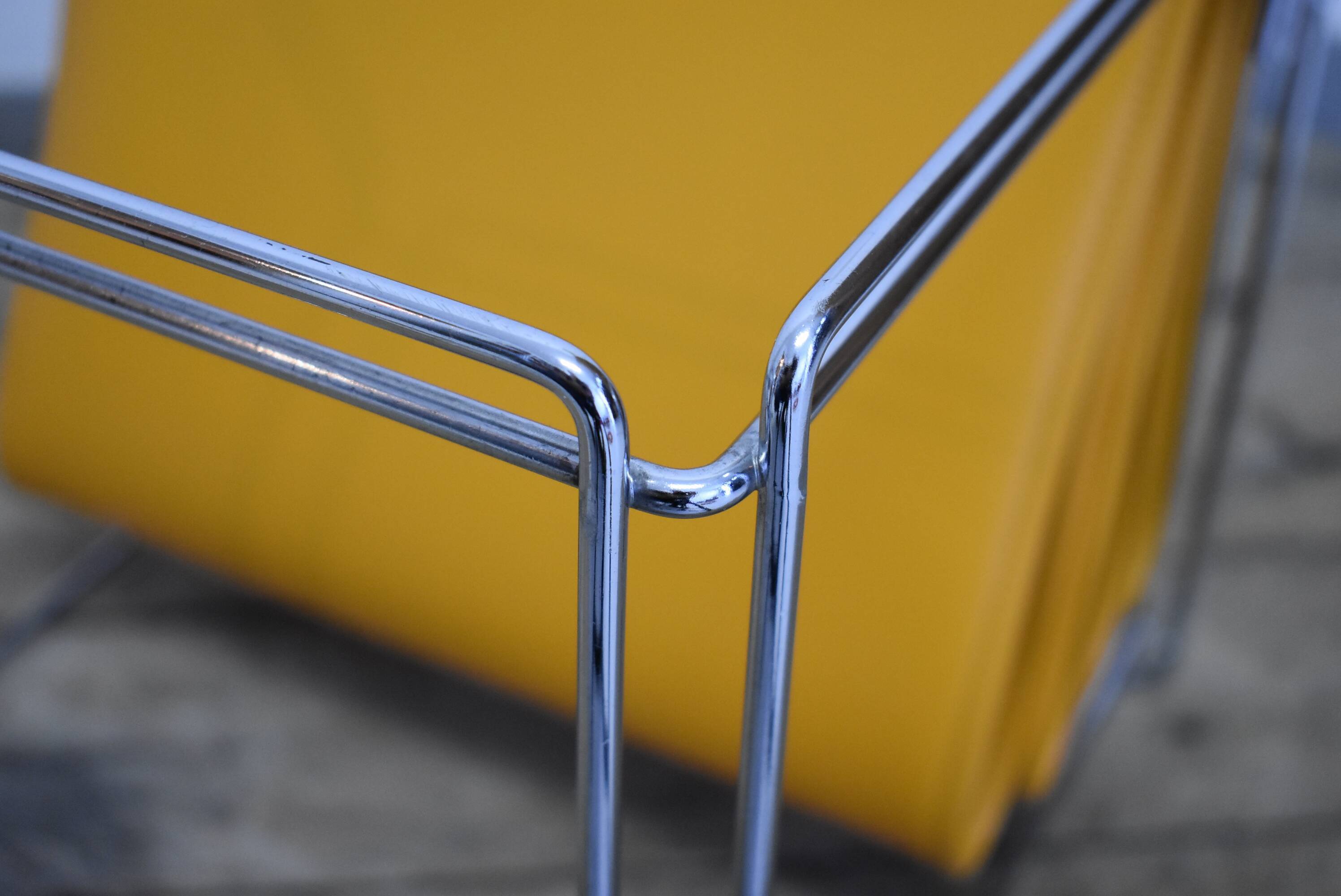 70s Orange magazine holder by Max Sauzé