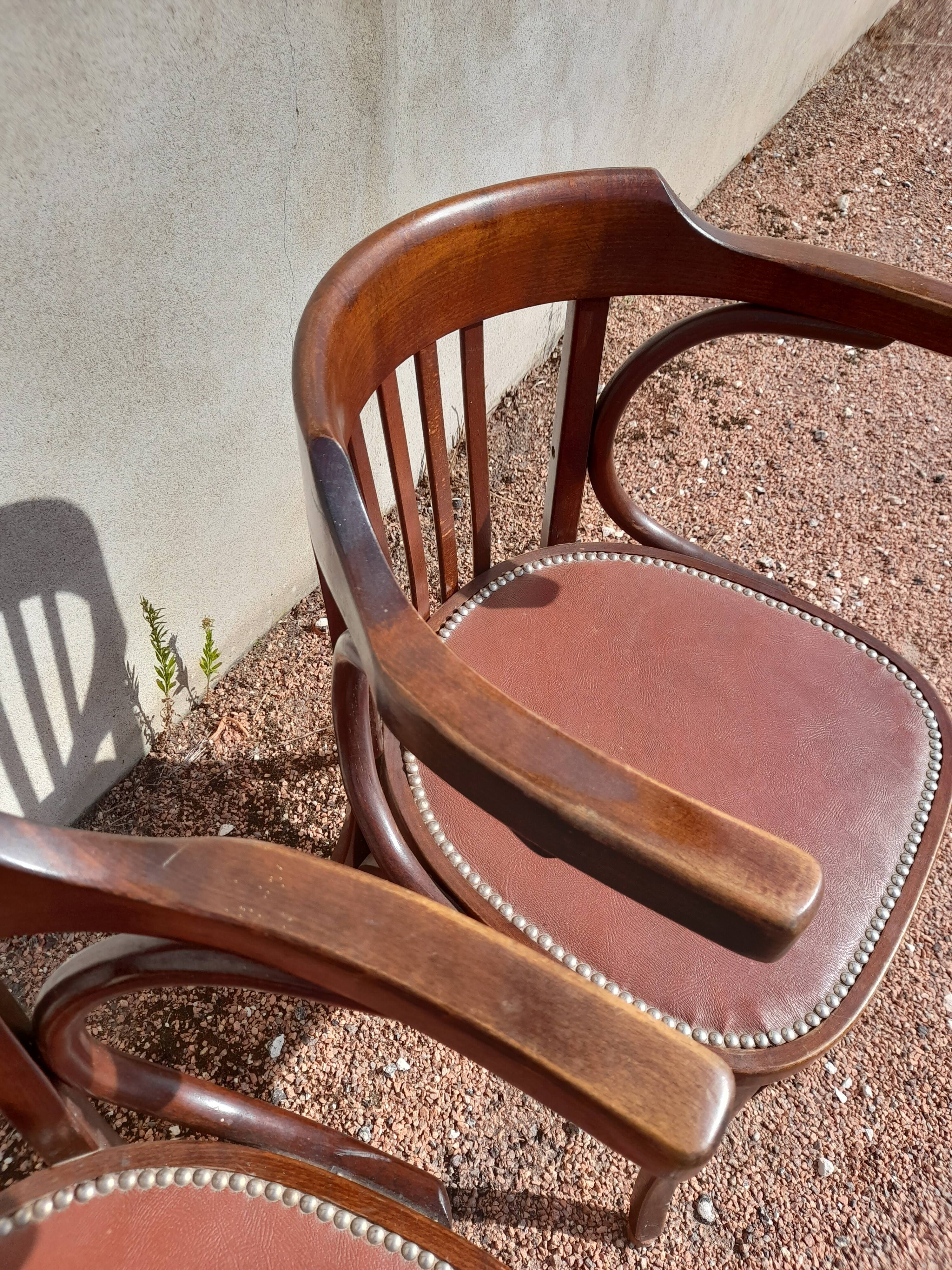 Pair of bistro armchairs signed Baumann 1930