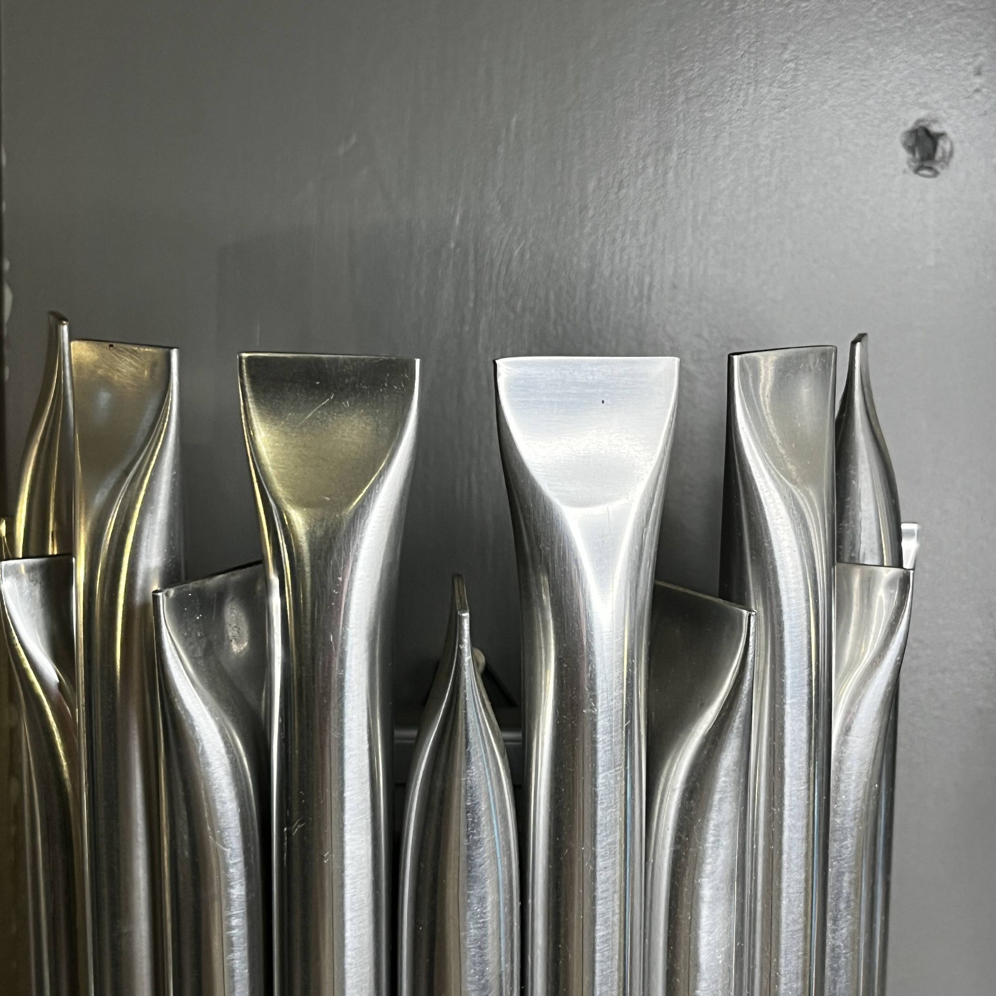Raak 'concorde' pair of wall lights, 'organ tube' type in brushed aluminium, ca 1970