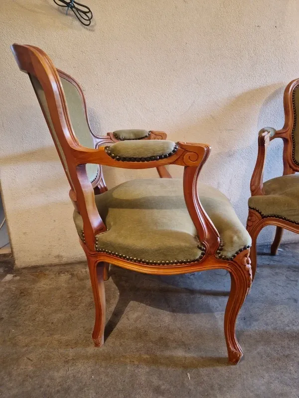 Pair of Louis XV style armchairs in cherry wood, upholstered in green velvet.