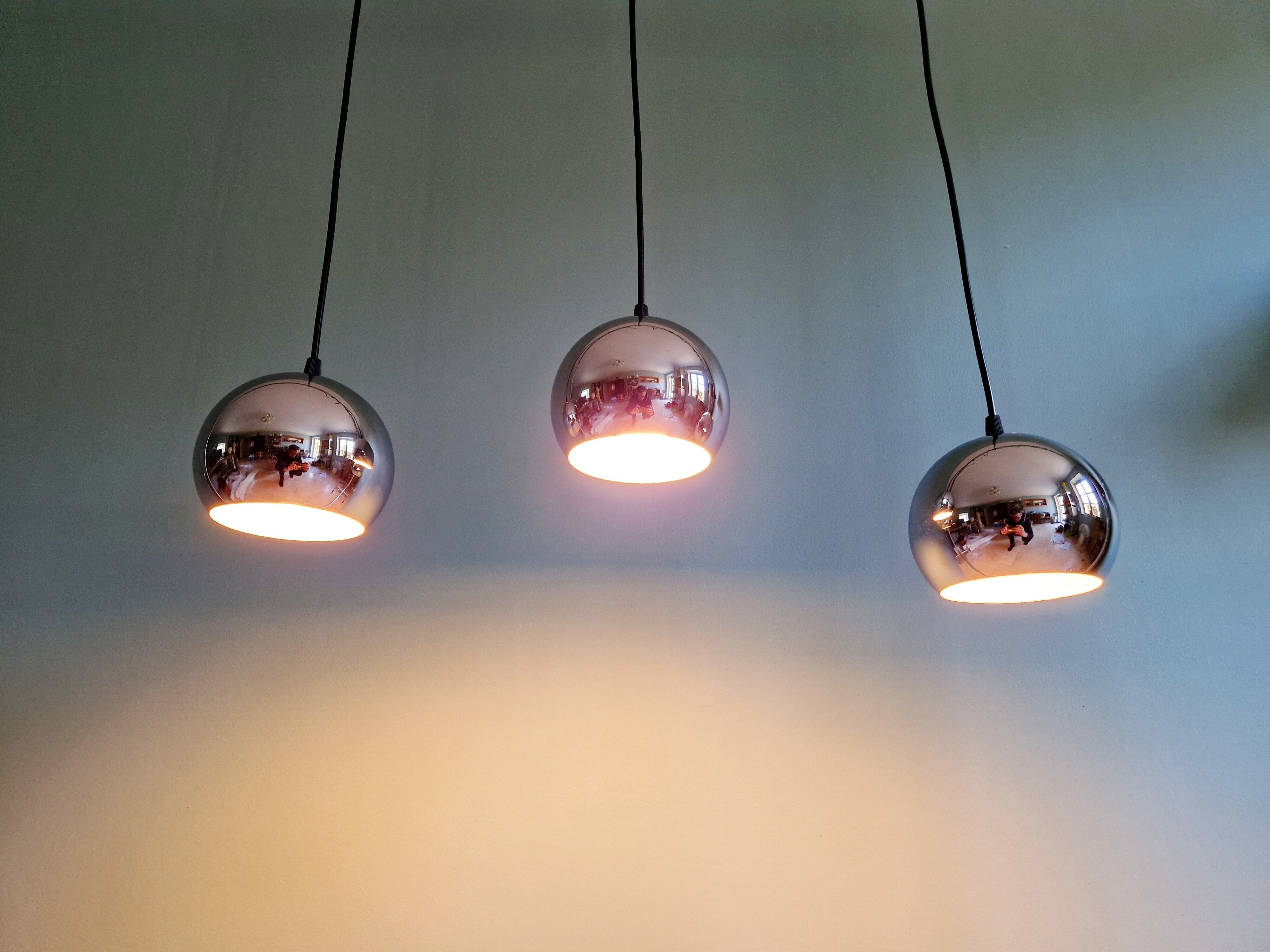 Chrome metal Eyeball suspension trio, Space Age design, 1970.