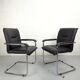Paire de fauteuils de bureau cuir et structure tubulaire chromé
