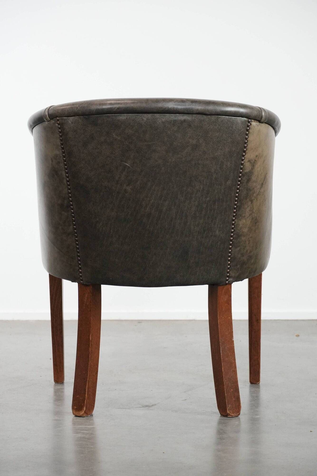 Amazing cow leather and wooden tub chair / side chair