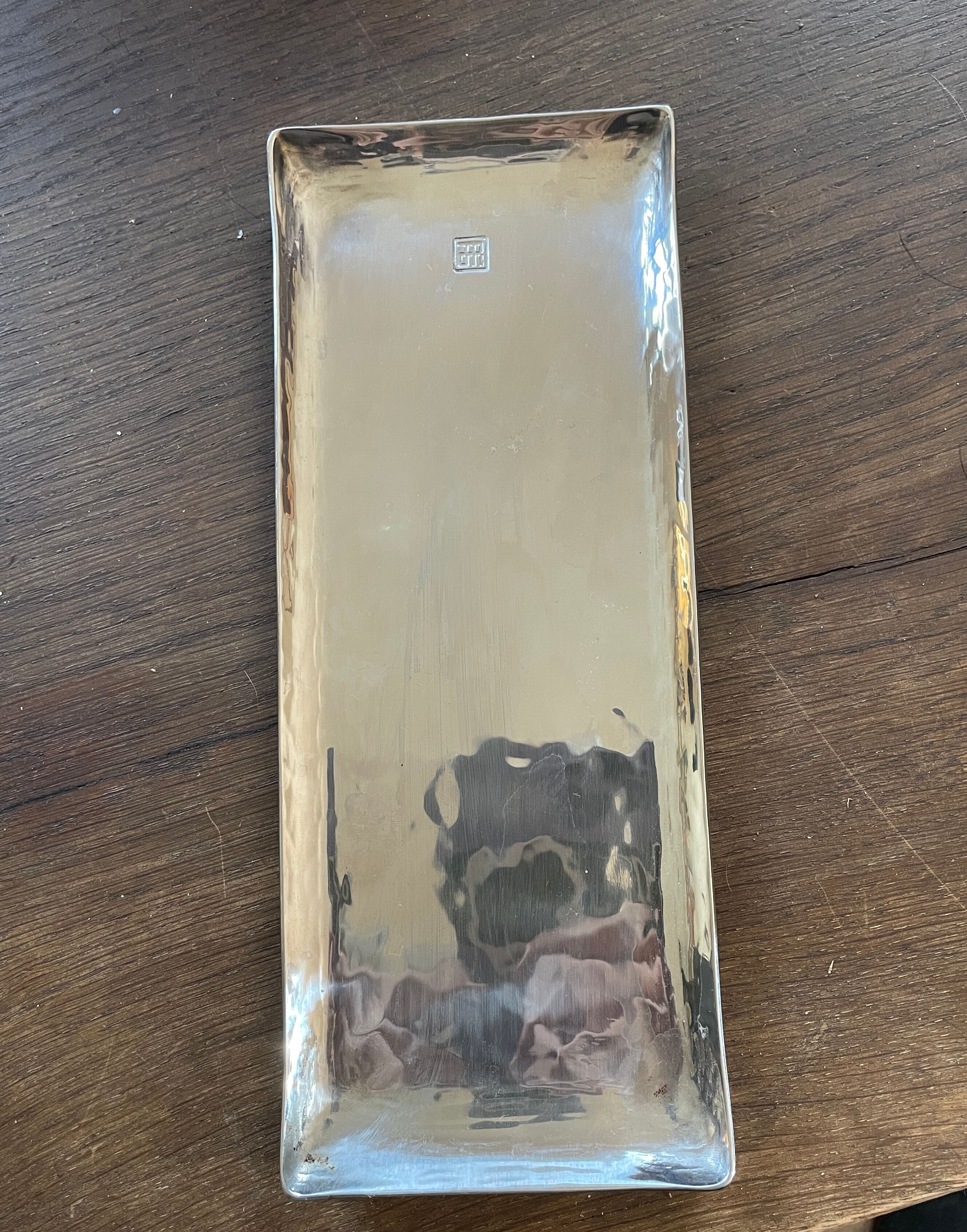 Empty silver metal pocket