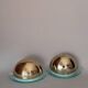 Pair of gold metal and plexiglass wall lights, circa 1980.