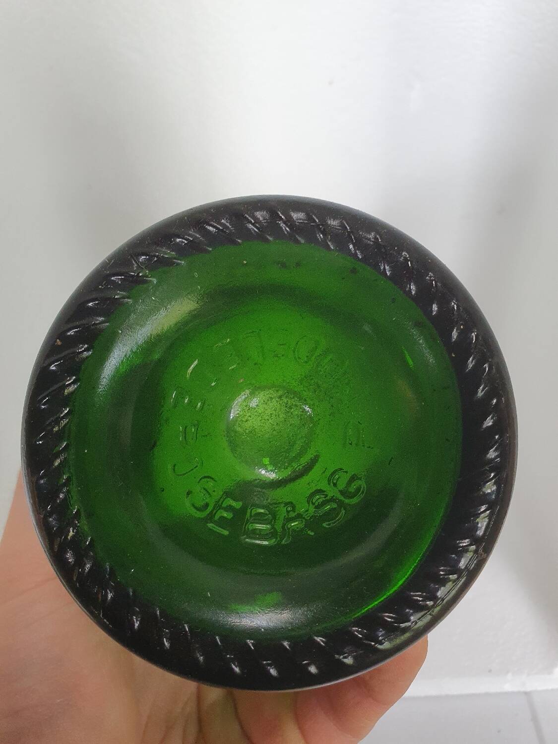 Old thick green glass bottle