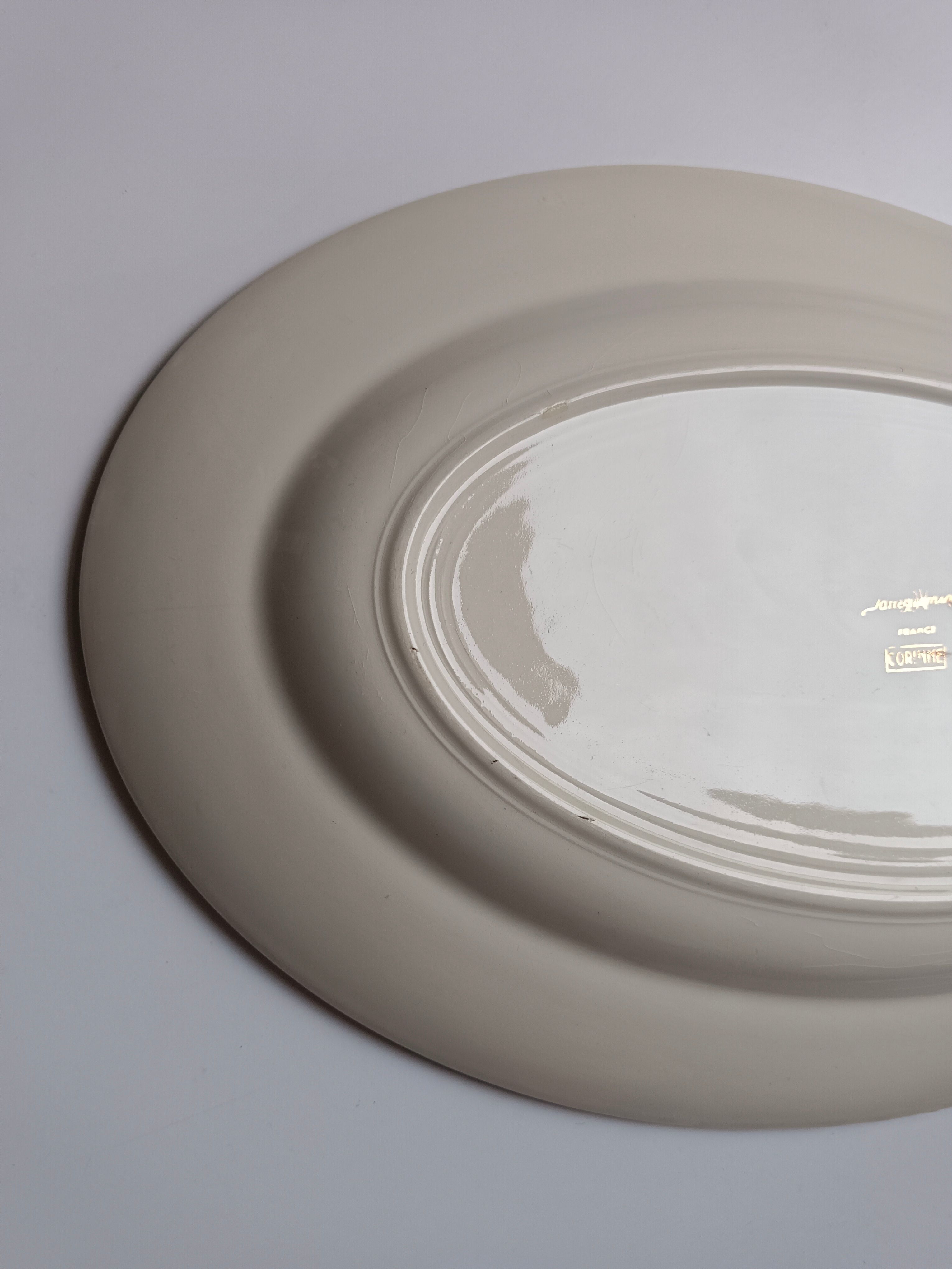 Oval plate Sarreguemines cream with pink gilding, antique.