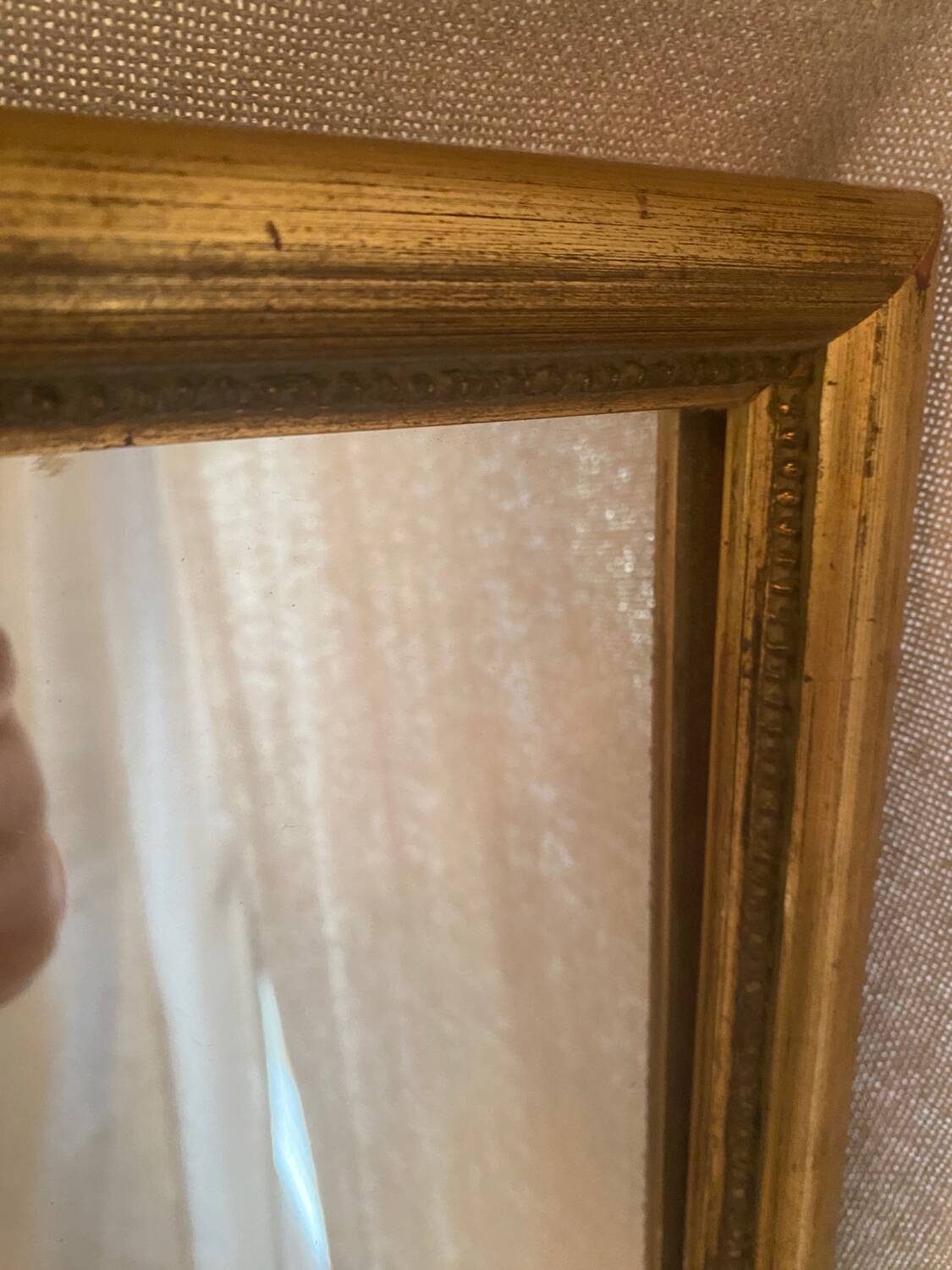 Large and old wooden mirror