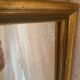 Large and old wooden mirror
