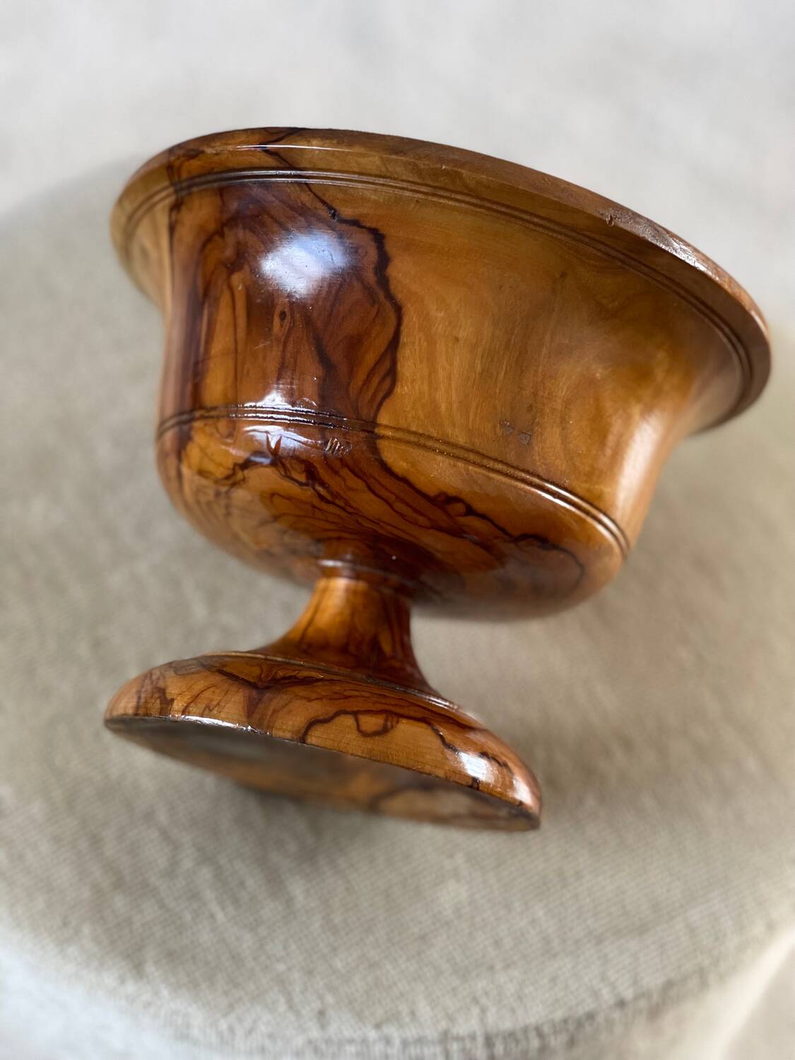 Empty pocket in olive wood